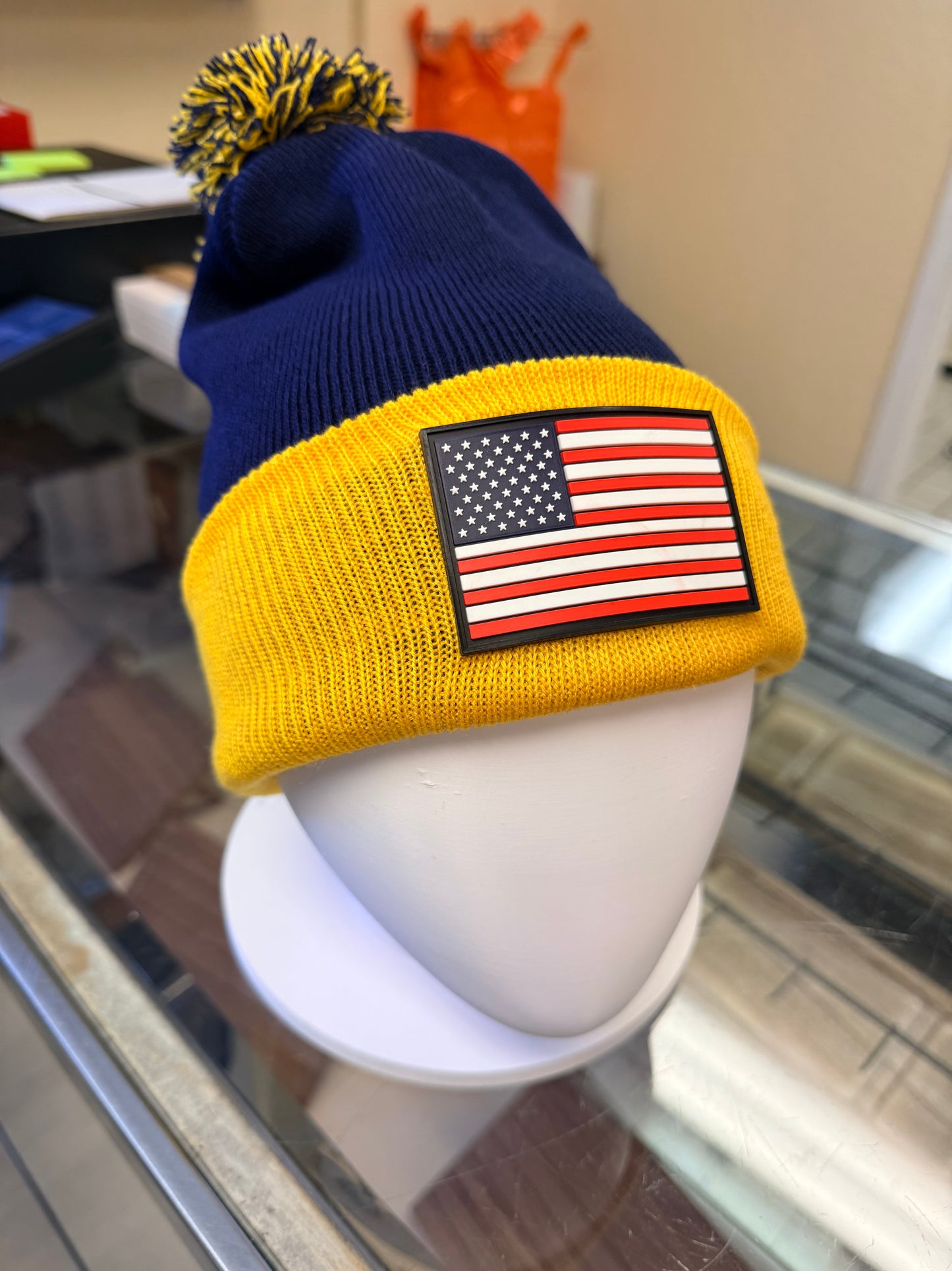 Sportsman 12" Pom-Pom Cuffed Beanie with American Flag Patch - SP15